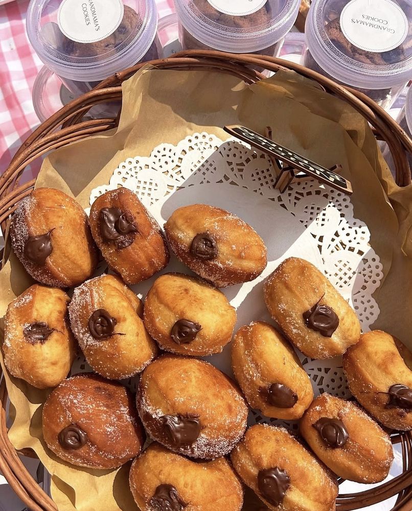 Basket of sugared Nutella-filled berliners
