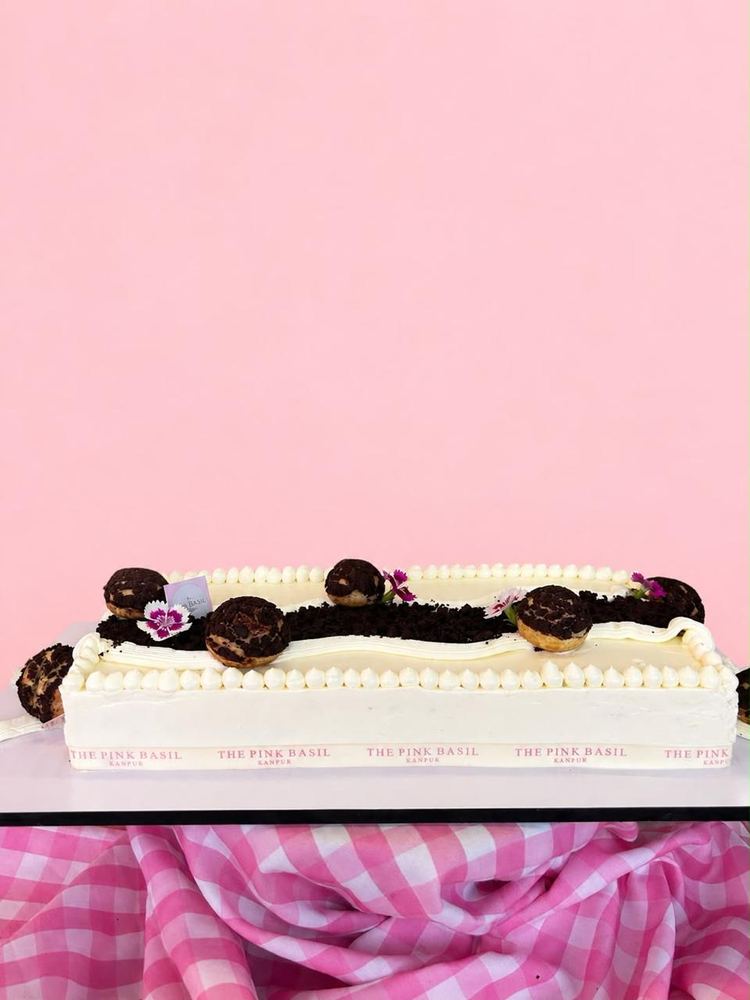 Grazing sheet cake with choux buns and cookie crumble